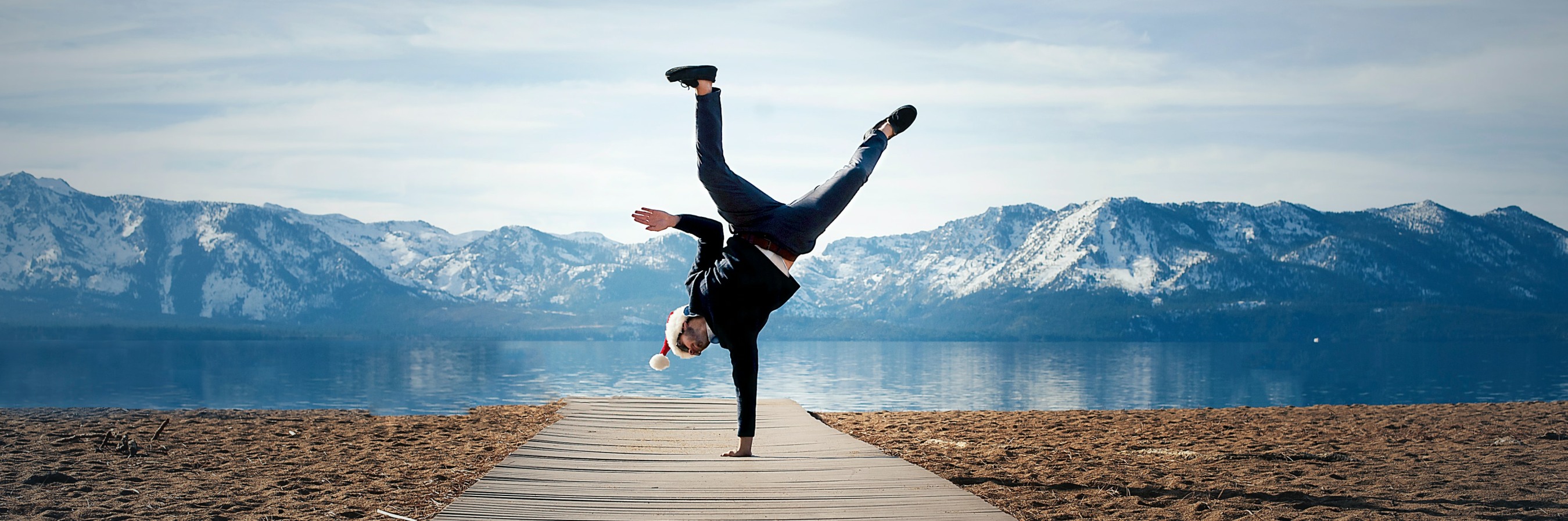 Man doing one handed handstand