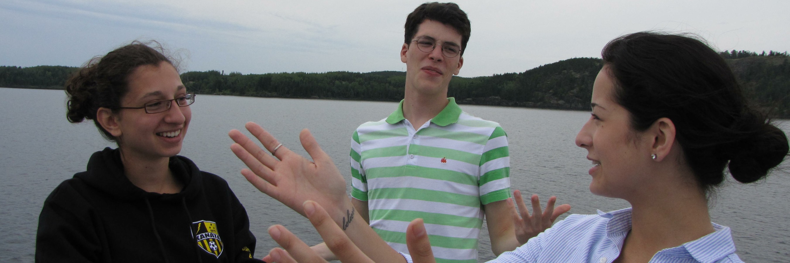 Three people discussing