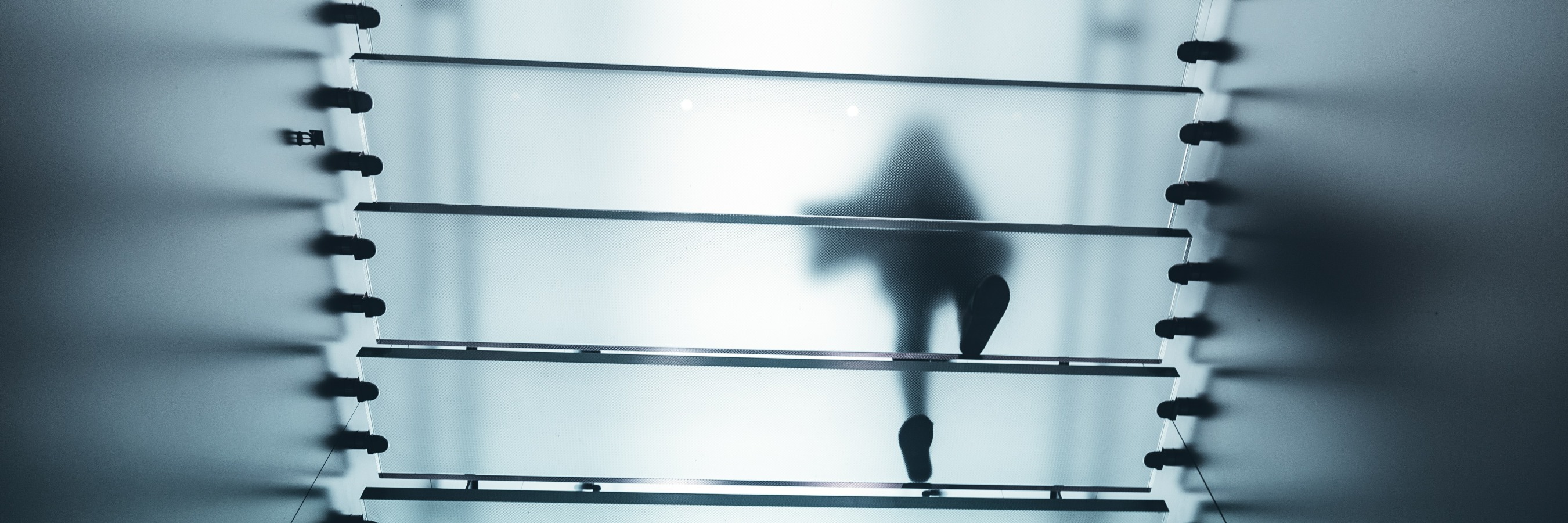 Walking up misted glass steps