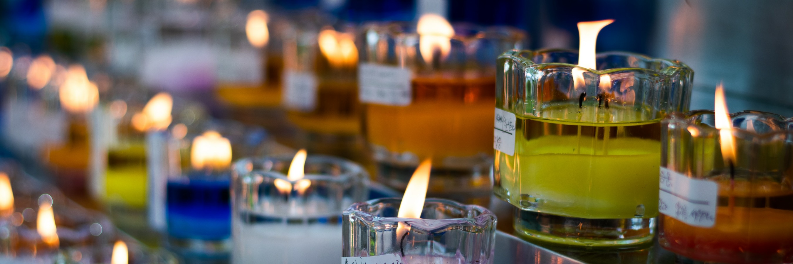 Votive candles burning